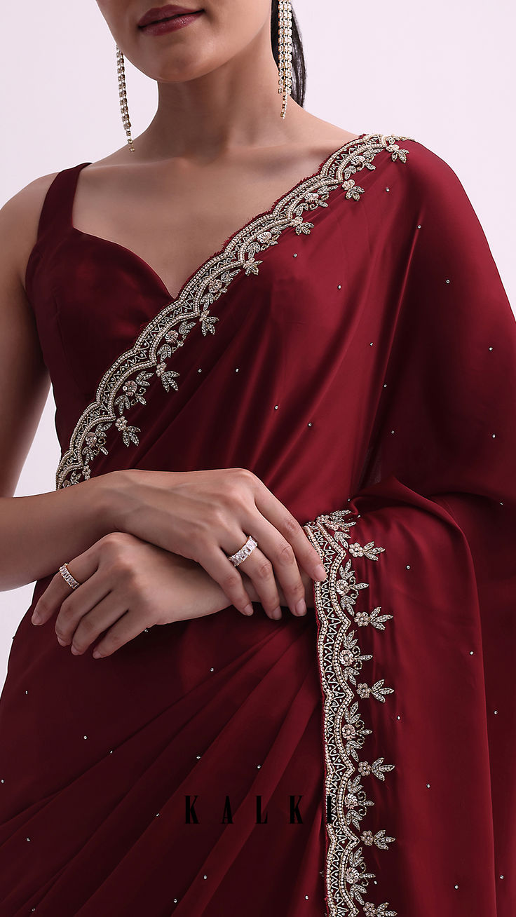 Women Magenta Sheer Saree with Gold Motif Border